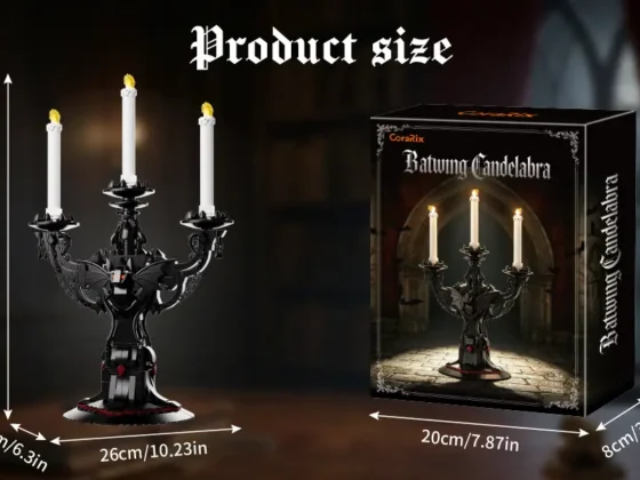 Close-up details of the bat motif chains candle branches and carved candelabra base